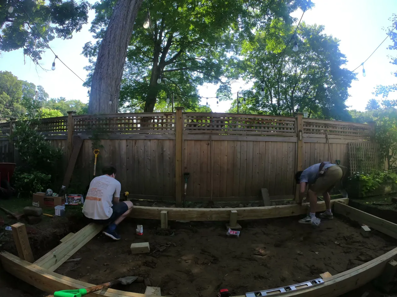 New deck framing laid out in the backyard