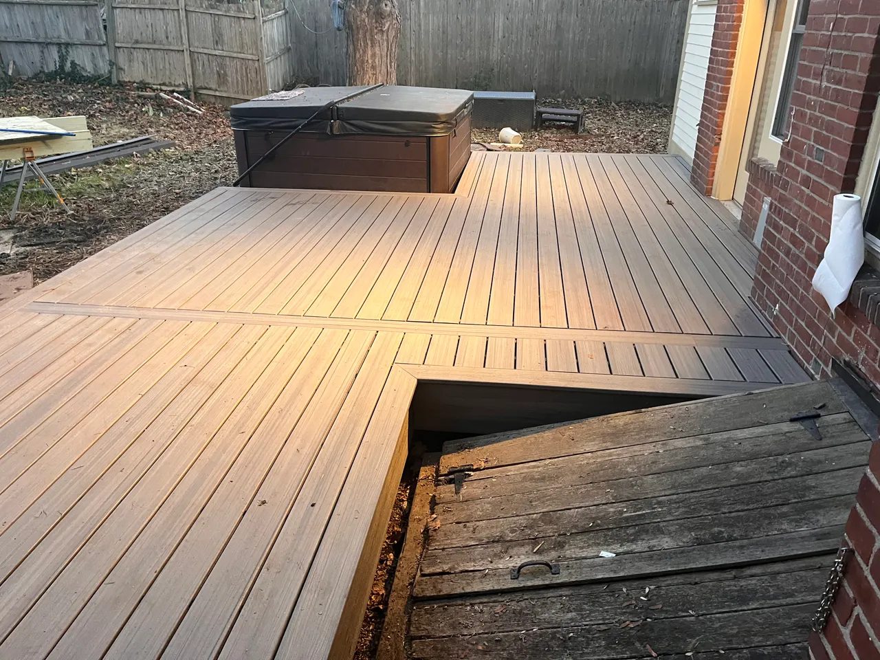 Composite decking meeting the hot tub and the old deck