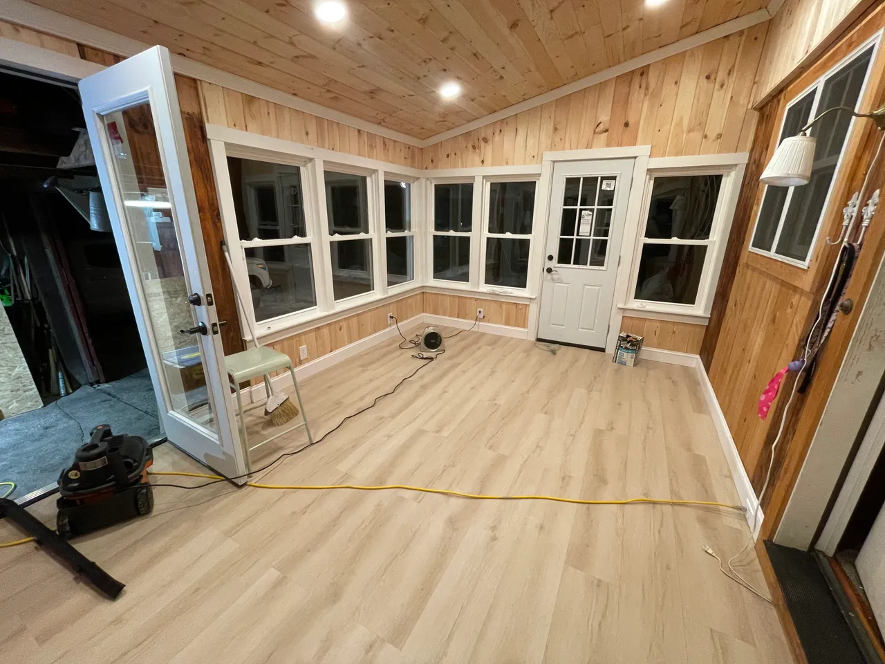New exterior door and windows in the renovated porch
