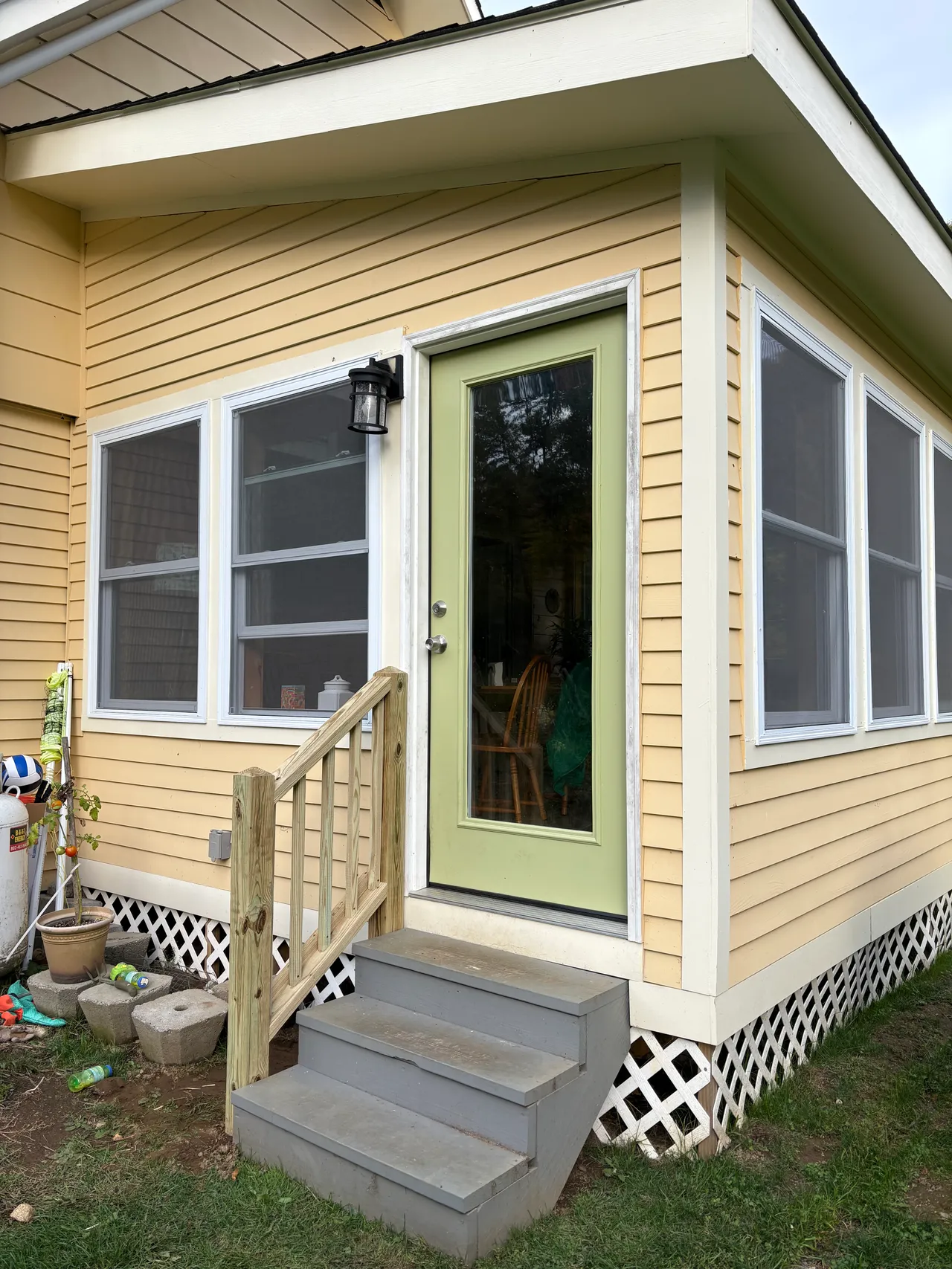 Entry door and steps of the finished sunroom